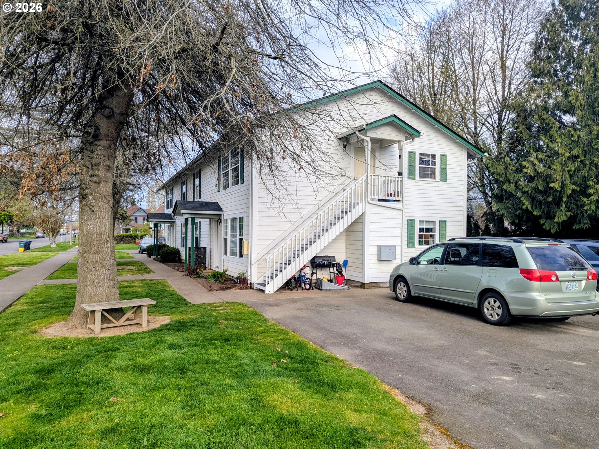 224 C Street Independence, OR 97351 - Photo 35 of 36 a view of house with a big yard and large trees