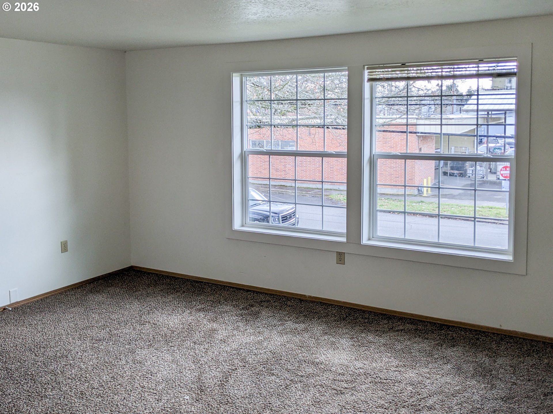 224 C Street Independence, OR 97351 - Photo 9 of 36 an empty room with a window