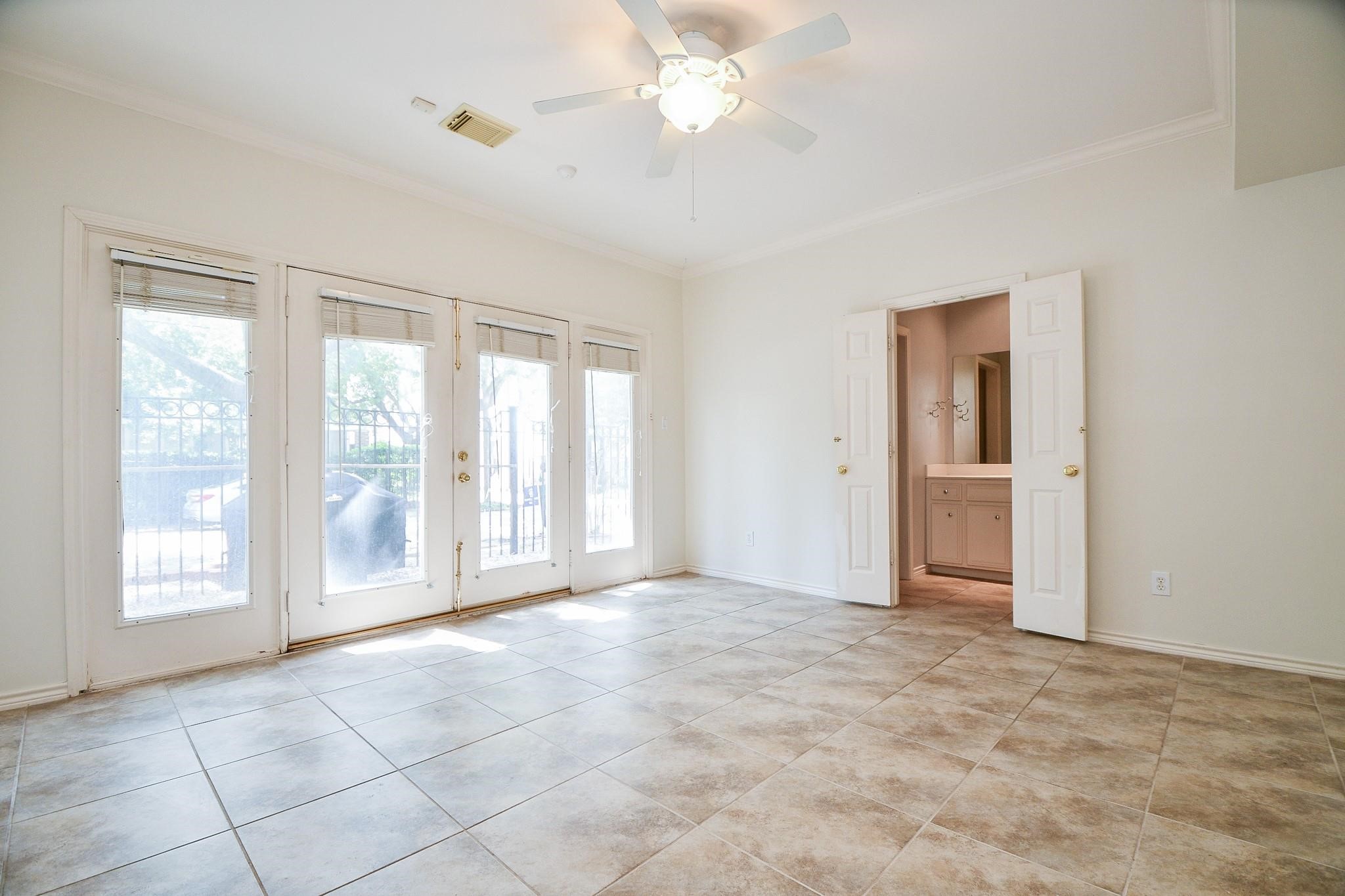 1025 Marconi Street Houston, TX 77019 - Photo 14 of 19 a view of an empty room with a window