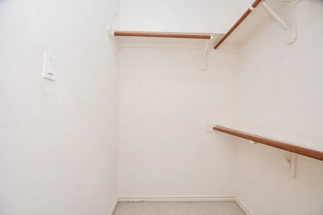 a view of small space with racks on the wall