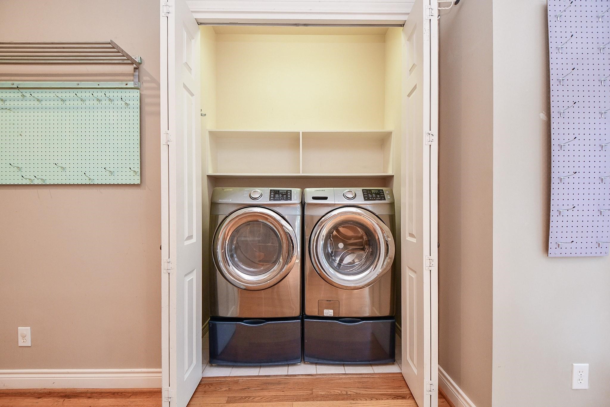 1025 Marconi Street Houston, TX 77019 - Photo 18 of 19 a view of a bathroom with washing machine