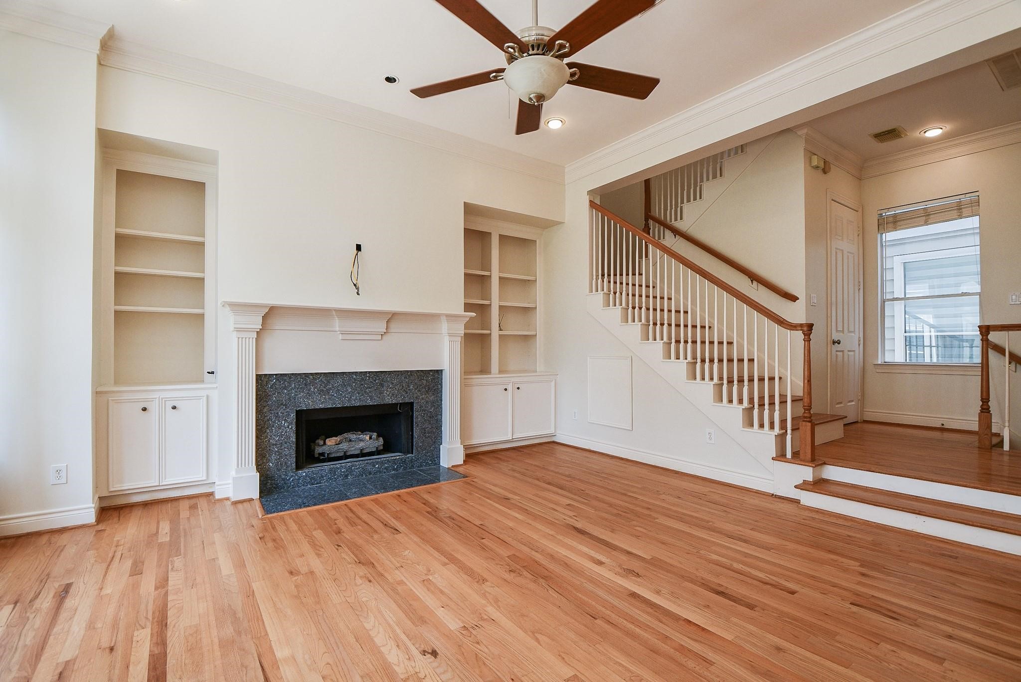 1025 Marconi Street Houston, TX 77019 - Photo 3 of 19 a view of empty room with wooden floor and fan