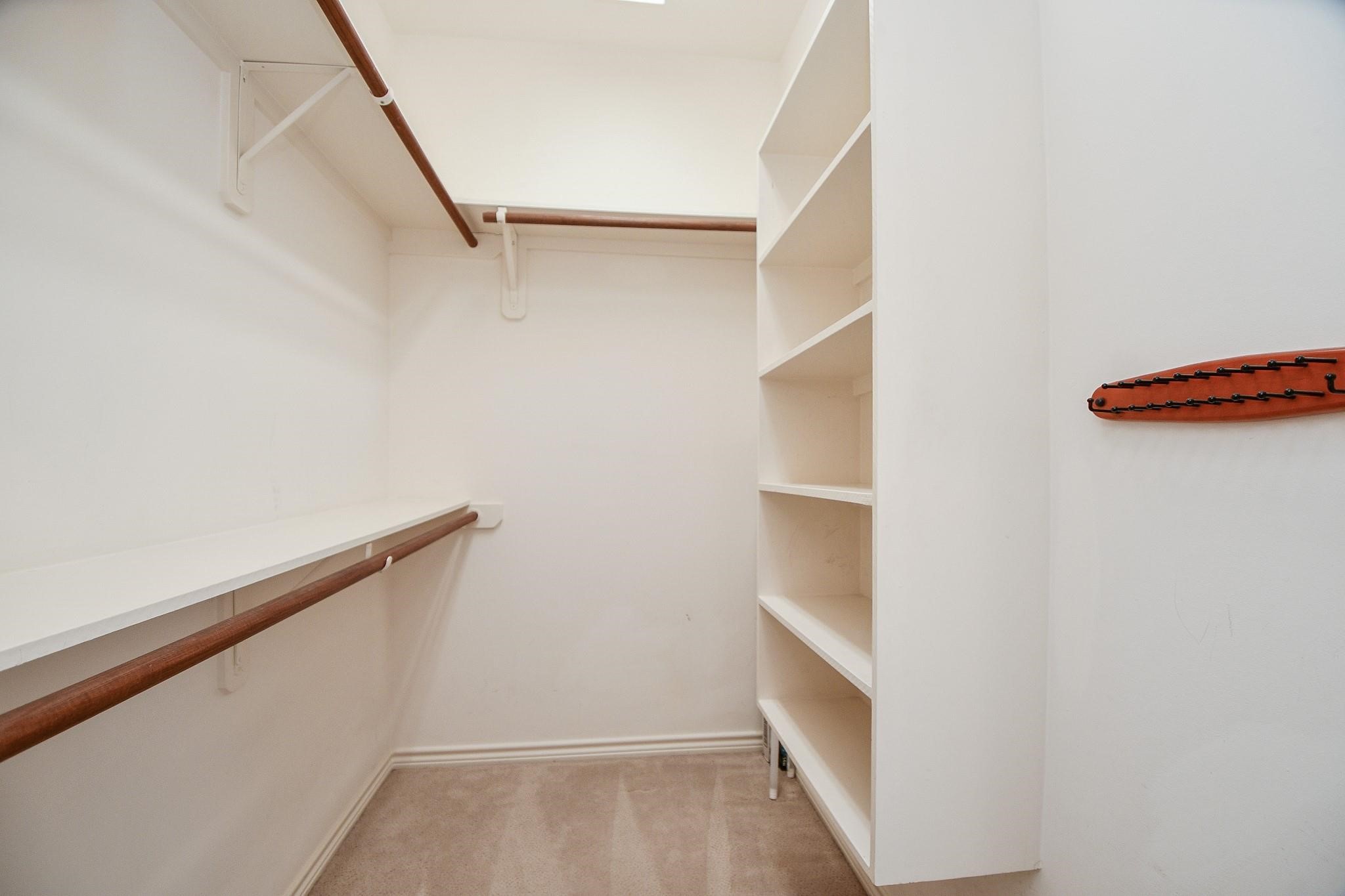 1025 Marconi Street Houston, TX 77019 - Photo 10 of 19 a view of an empty walk in closet