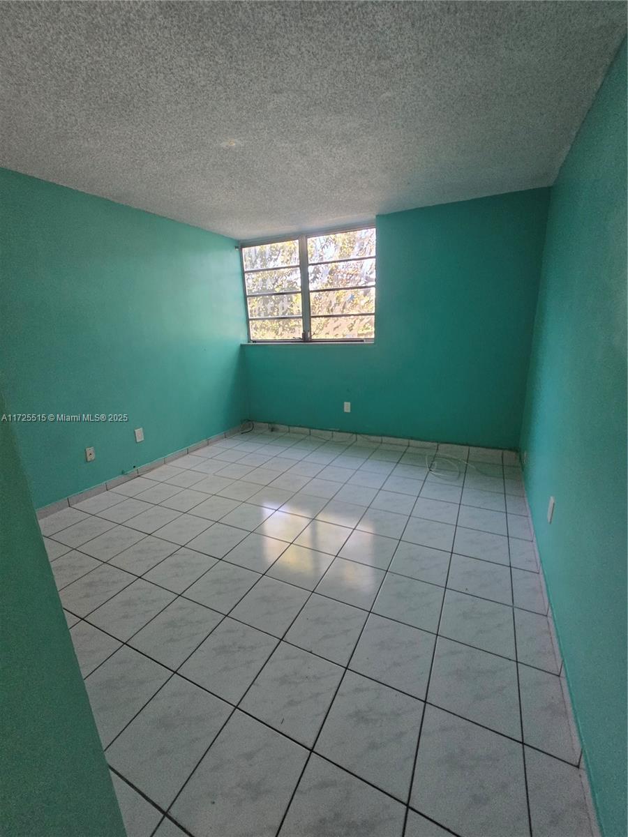 Fountainebleau Miami, FL 33172 - Photo 12 of 28 a view of a room that has a window in it