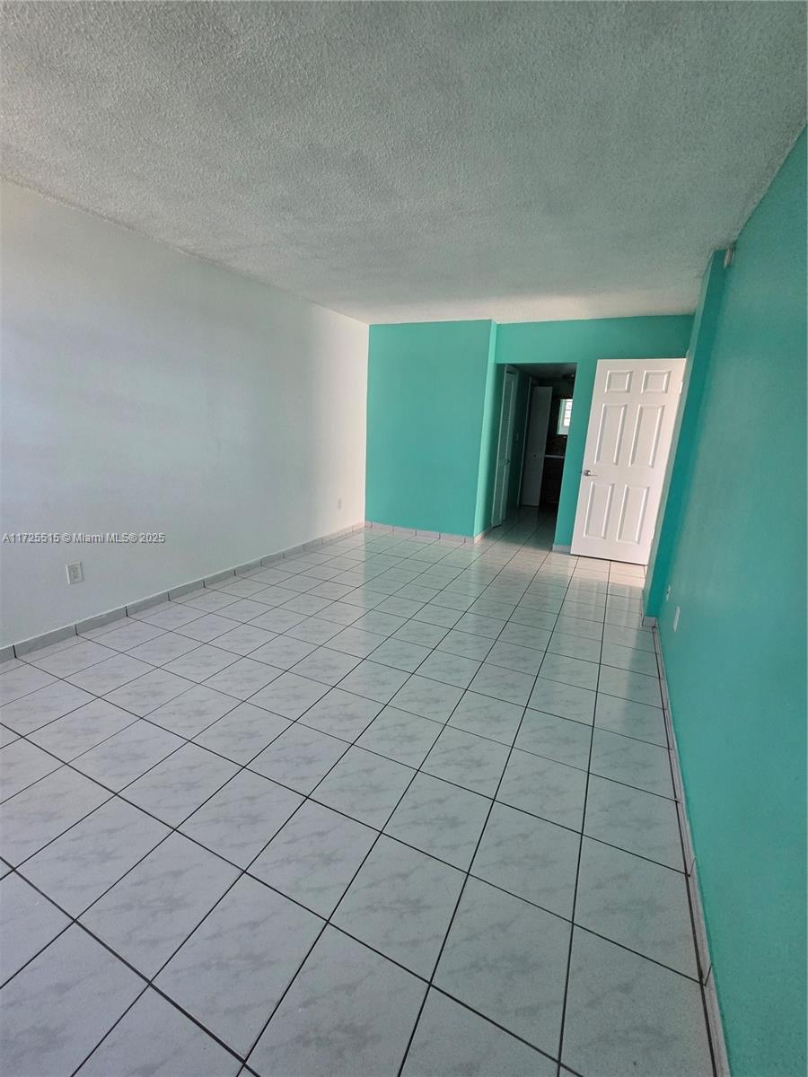 Fountainebleau Miami, FL 33172 - Photo 15 of 28 a view of an empty room and window