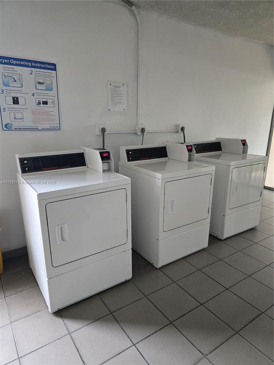 Fountainebleau Miami, FL 33172 - Photo 26 of 28 a utility room with dryer and washer