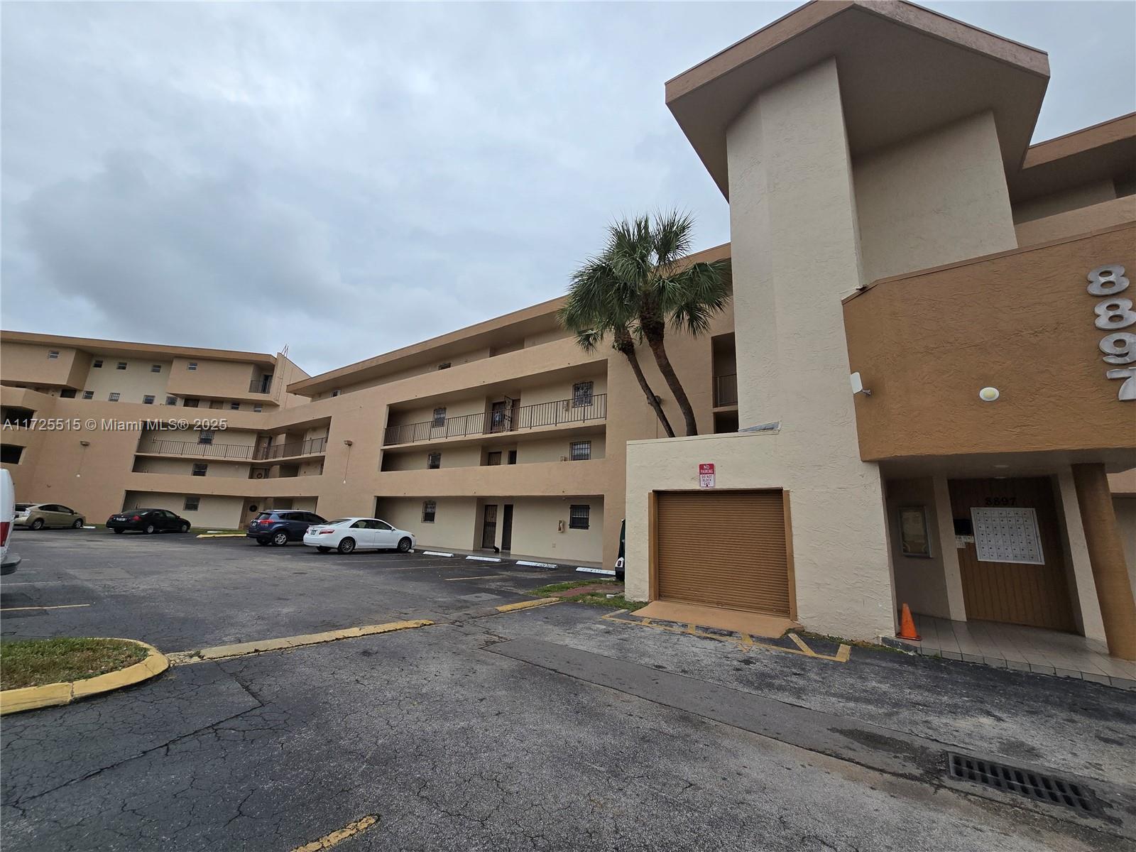Fountainebleau Miami, FL 33172 - Photo 27 of 28 a view of a house with a garage and a garage