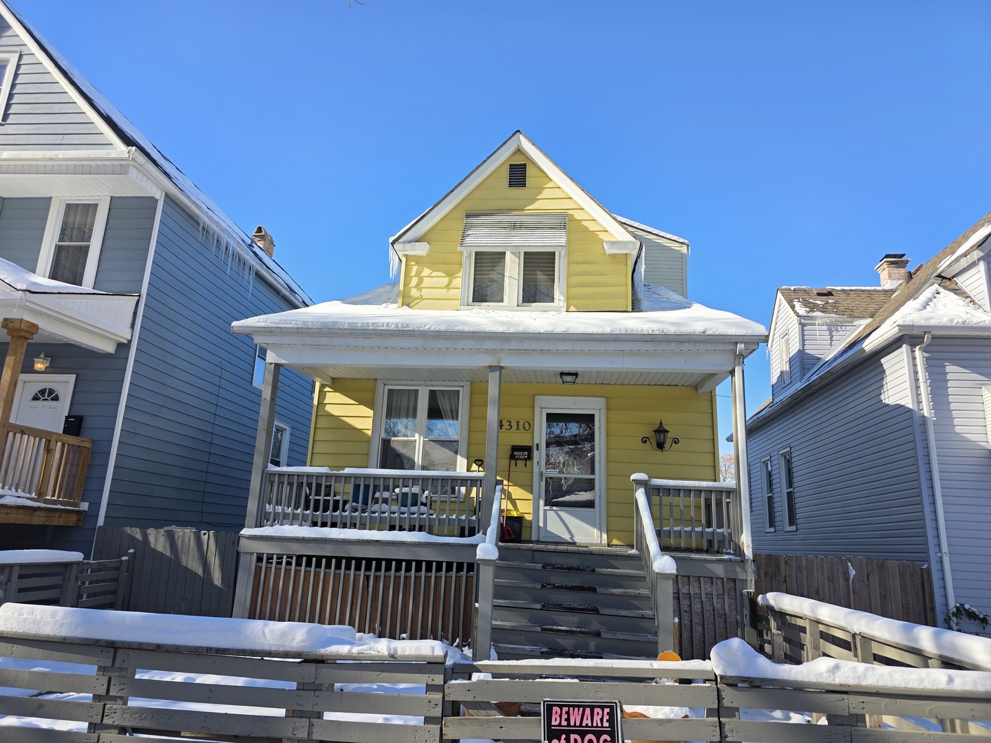 a front view of house with street