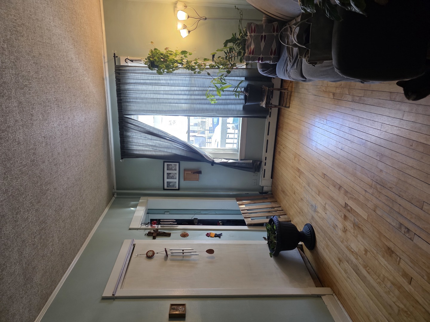 4310 North Central Park Avenue Chicago, IL 60618 - Photo 2 of 15 a view of washer and dryer with wooden floor
