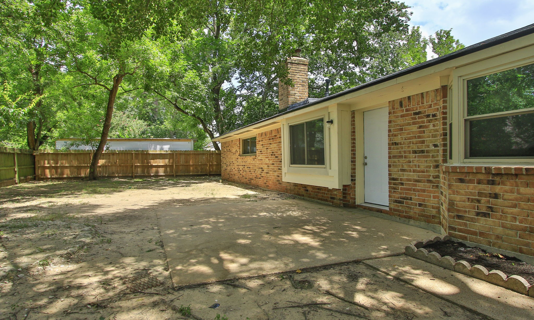 9726 John Bank Drive Spring, TX 77379 - Photo 30 of 36 You can let your imagination run wild with this oversized backyard.