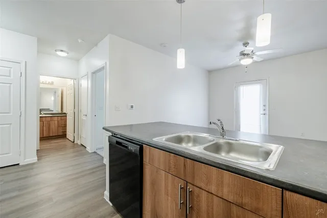 a bathroom with a bathtub and a toilet