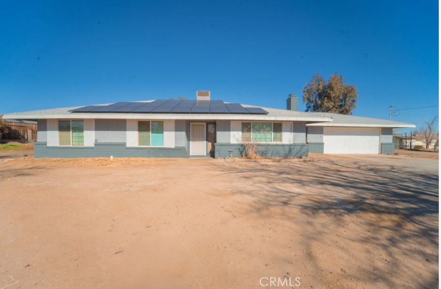 a view of a house with a swimming pool