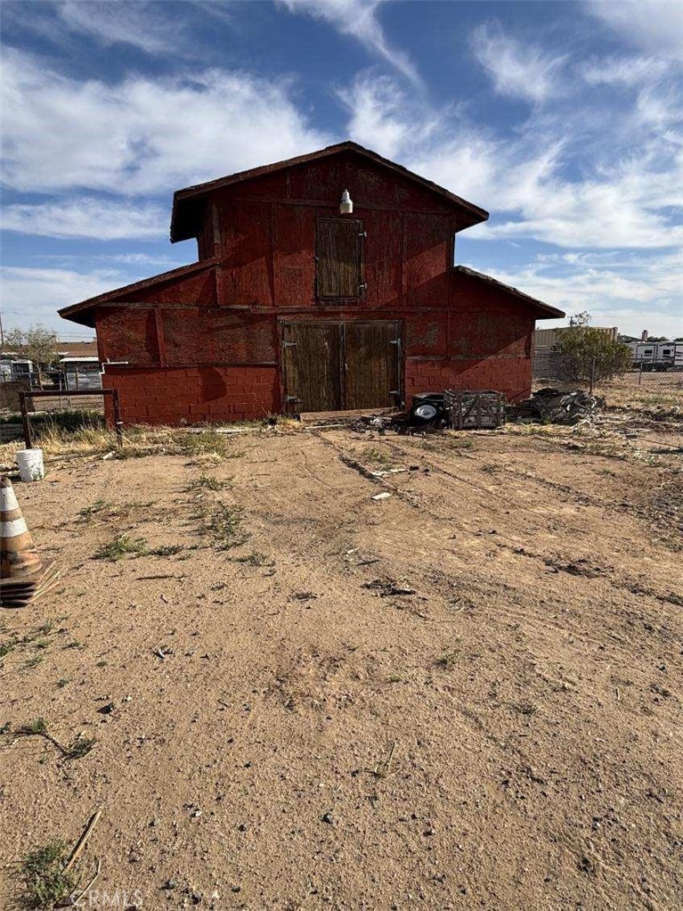 15032 Birch Street Hesperia, CA 92345 - Photo 20 of 21 a view of a house with a yard