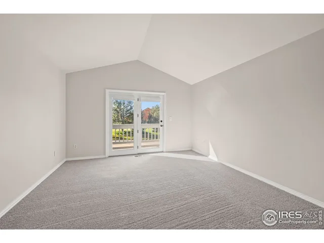 a bathroom with a granite countertop sink a mirror and a shower