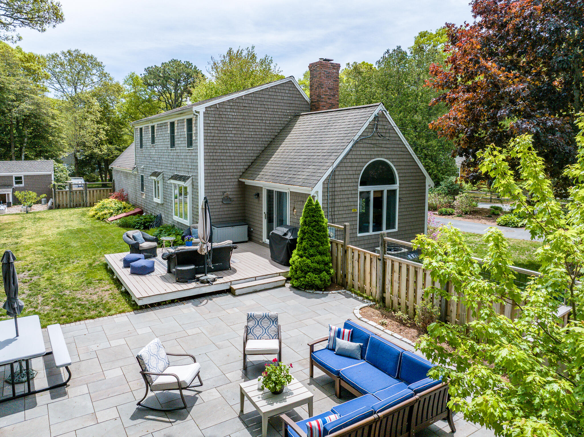 61 Angus Way Centerville, MA 02632 - Photo 54 of 59 a front view of a house with garden