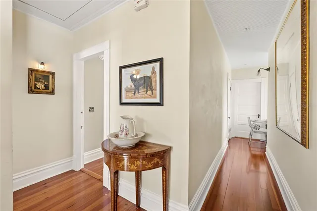 a view of a house with swimming pool and sitting area