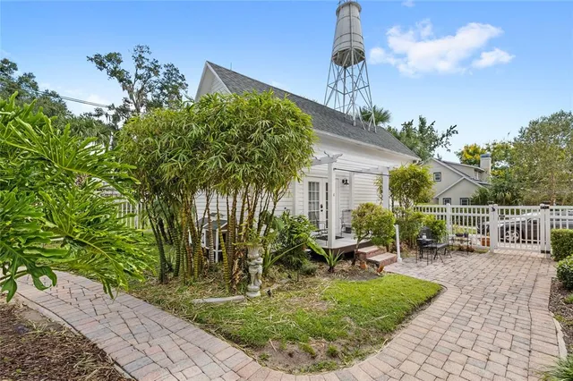 a view of a swimming pool with outdoor seating