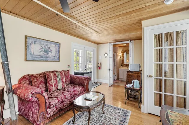 an aerial view of a house with outdoor space pool seating area and yard