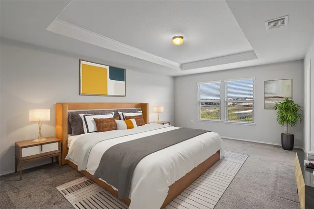 a bedroom with bed and a window