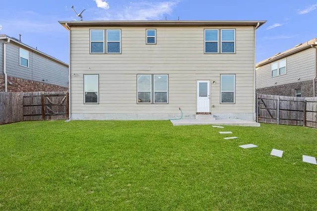 a front view of house with yard