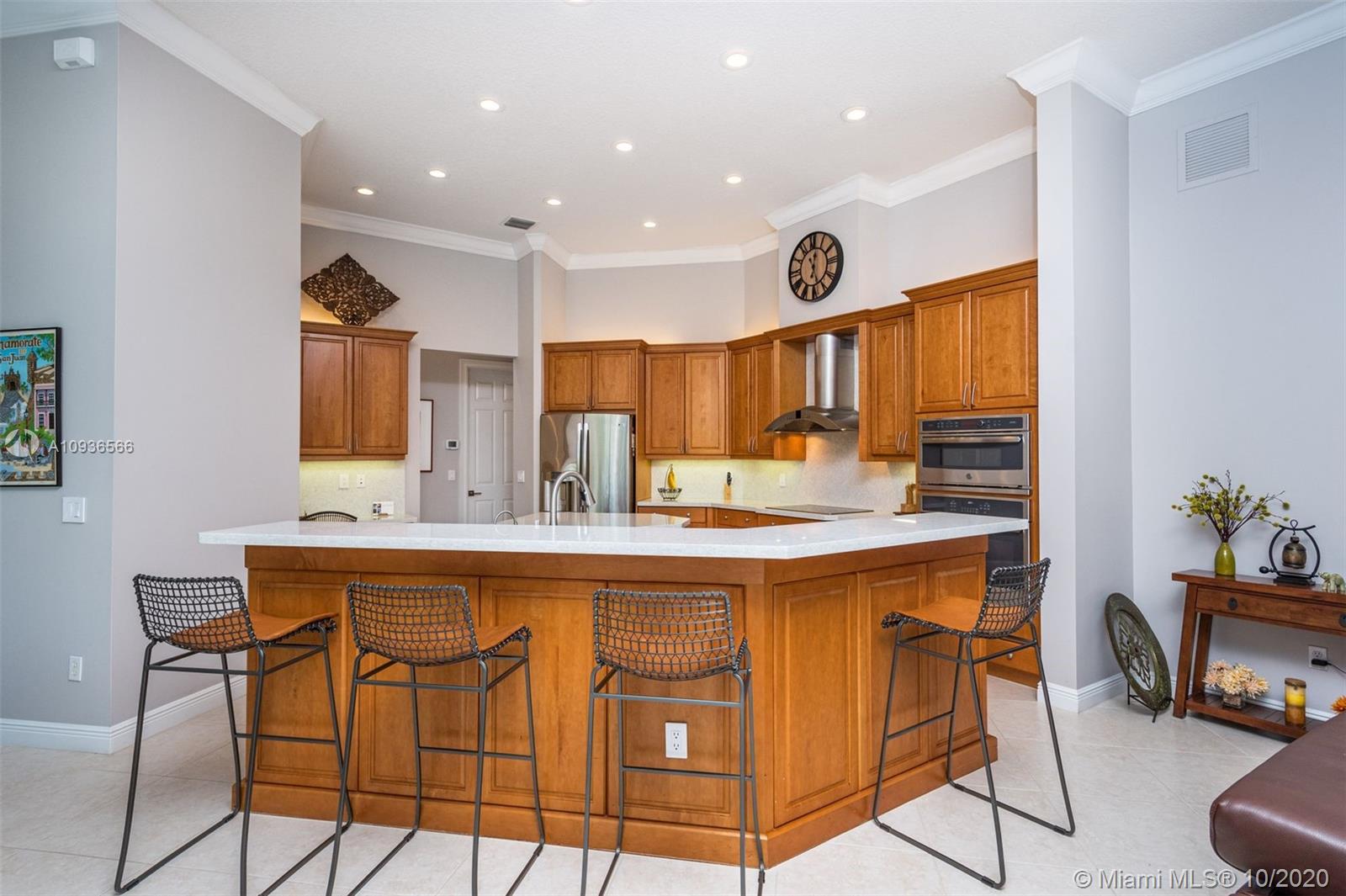 10477 Laurel Road Davie, FL 33328 - Photo 15 of 35 Kitchen opens up to family and breakfast area