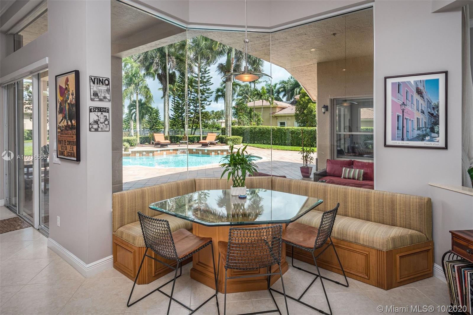 10477 Laurel Road Davie, FL 33328 - Photo 17 of 35 Breakfast area overlooks pool and patio