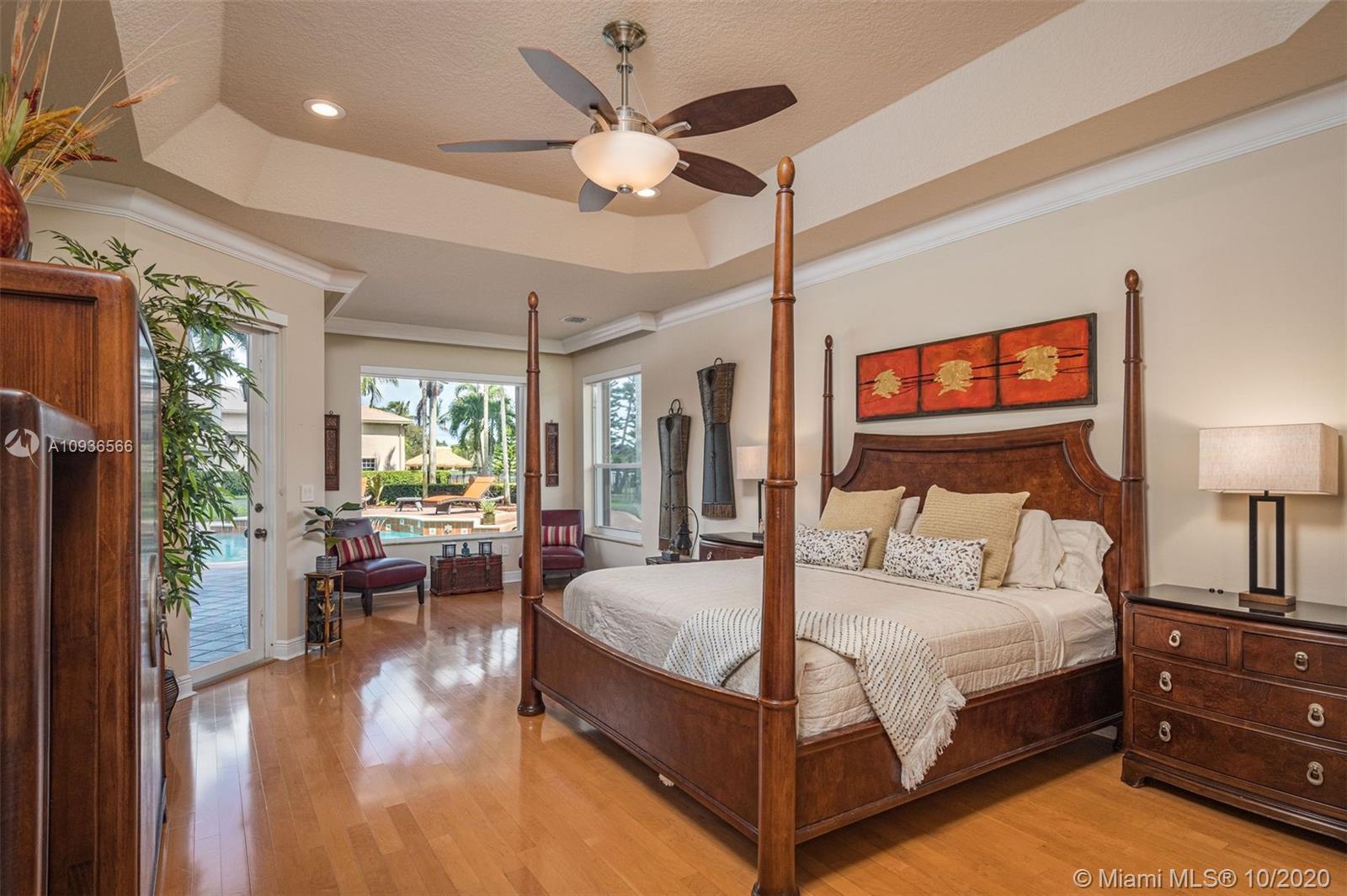 10477 Laurel Road Davie, FL 33328 - Photo 23 of 35 Main bedroom with sitting area overlooking pool area...