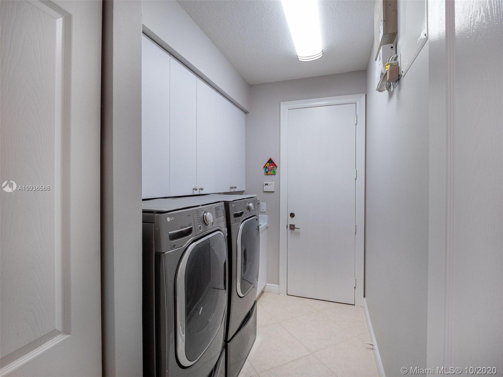 10477 Laurel Road Davie, FL 33328 - Photo 33 of 35 Separate laundry room leading to 3 car garage...