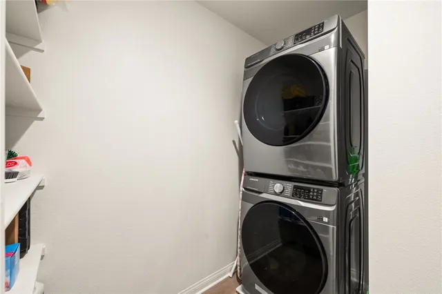 a view of a chair and table in the balcony
