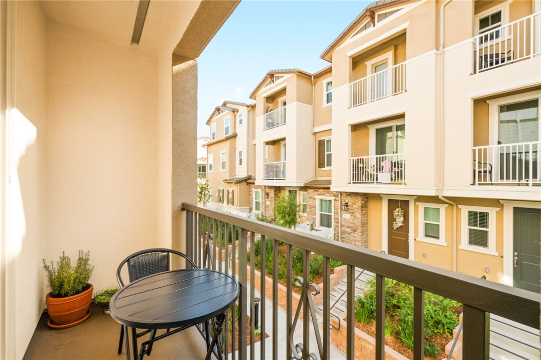 8633 Amherst Street Santee, CA 92071 - Photo 28 of 61 a view of a chair and table in the balcony
