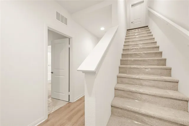 a view of entryway with wooden floor