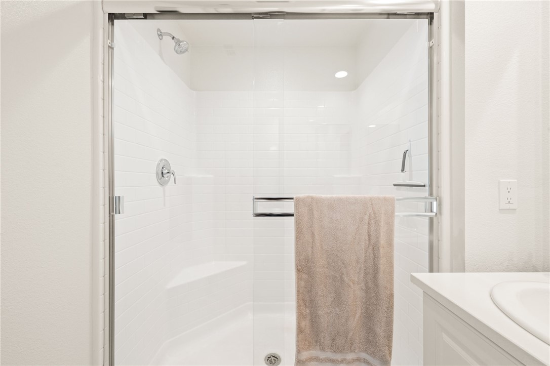 8633 Amherst Street Santee, CA 92071 - Photo 38 of 61 a bathroom with a shower and a sink
