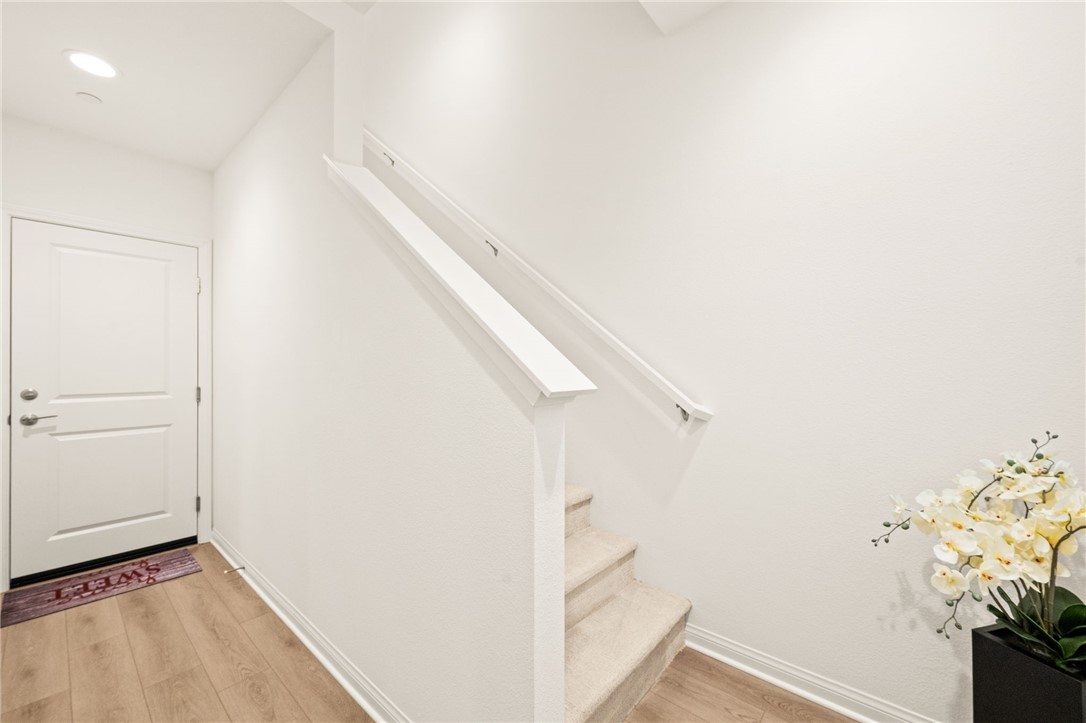 8633 Amherst Street Santee, CA 92071 - Photo 4 of 61 a view of entryway with wooden floor