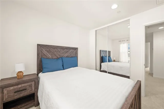 a bathroom with a sink a toilet and shower curtain