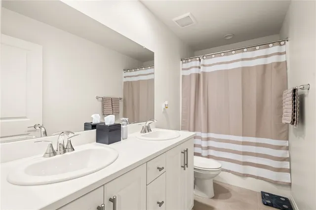 a view of a swimming pool with a lounge chairs