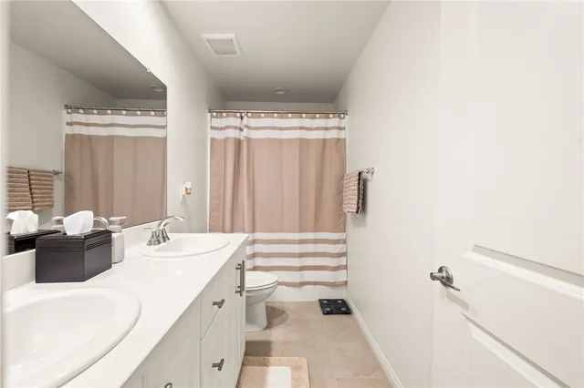 a view of a patio with swimming pool