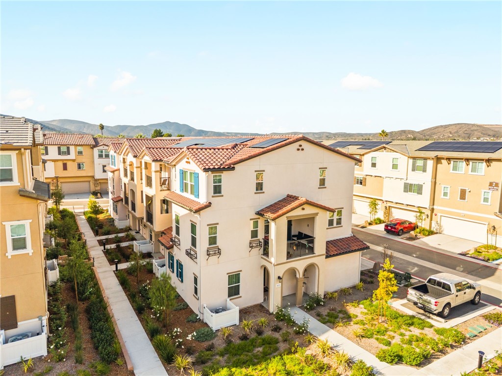 8633 Amherst Street Santee, CA 92071 - Photo 60 of 61 an aerial view of a residential apartment building with a yard