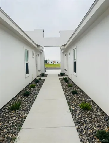 a large white room with a large window