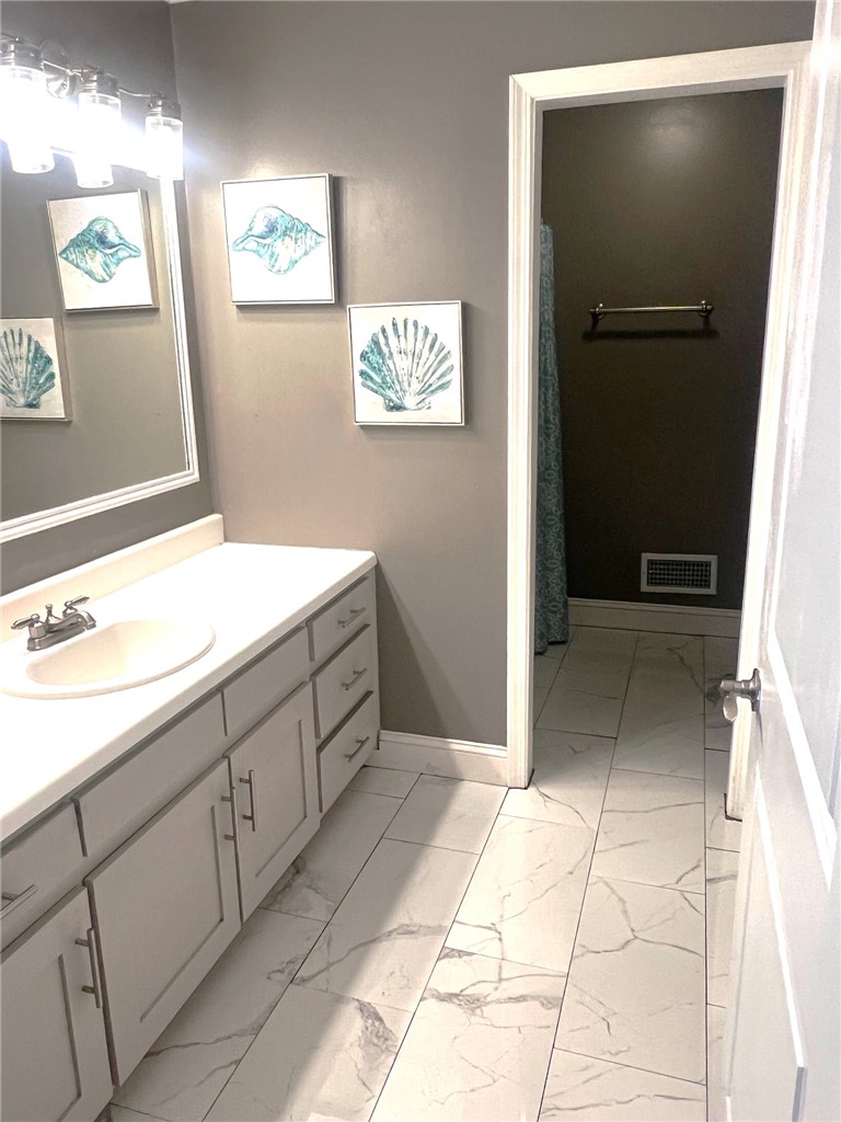 209 Keystone Drive Anderson, SC 29621 - Photo 13 of 20 This bathroom features a contemporary vanity and elegant tile flooring.