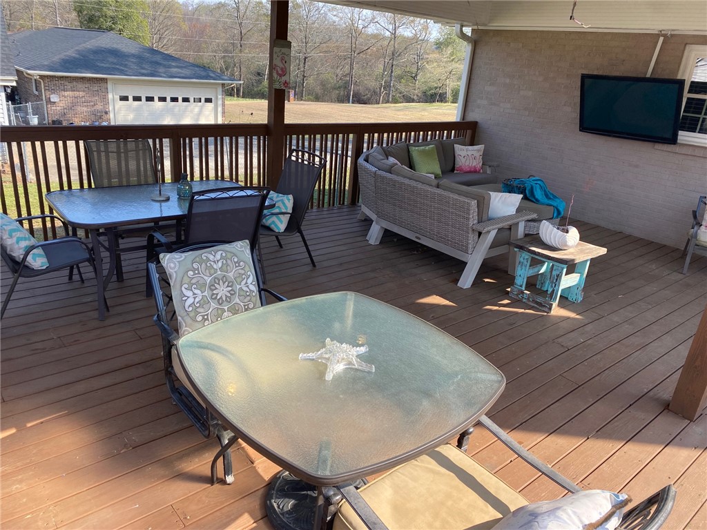 209 Keystone Drive Anderson, SC 29621 - Photo 17 of 20 This spacious deck provides an ideal outdoor living area for relaxation and entertaining.