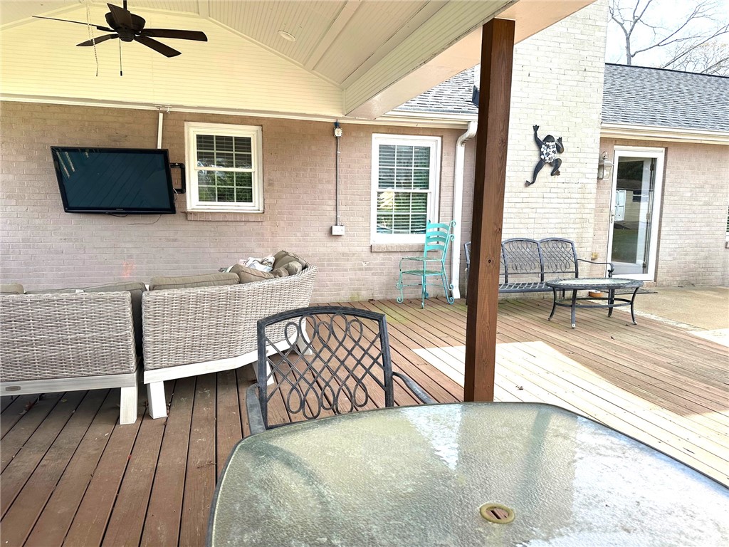 209 Keystone Drive Anderson, SC 29621 - Photo 18 of 20 This spacious outdoor area features a wooden deck and covered porch perfect for relaxing and entertaining.