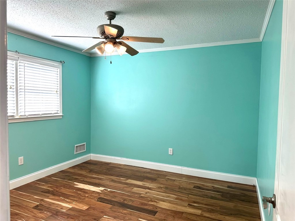 209 Keystone Drive Anderson, SC 29621 - Photo 10 of 20 This cozy room offers comfortable living with a beautiful window and rich hardwood flooring.