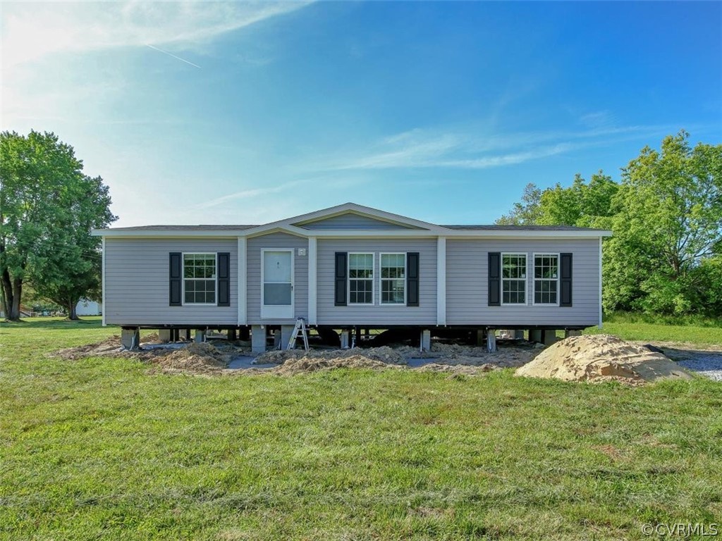 Tbd Railroad Avenue Dendron, VA 23839 - Photo 1 of 22 a view of a house with pool and sitting area