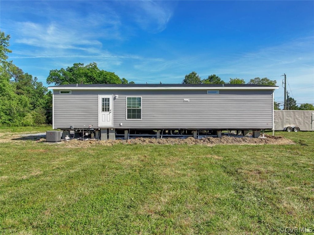 Tbd Railroad Avenue Dendron, VA 23839 - Photo 21 of 22 a view of a backyard with a garden