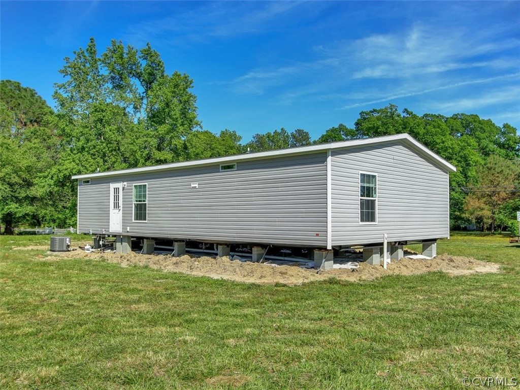Tbd Railroad Avenue Dendron, VA 23839 - Photo 22 of 22 a view of a house with a yard