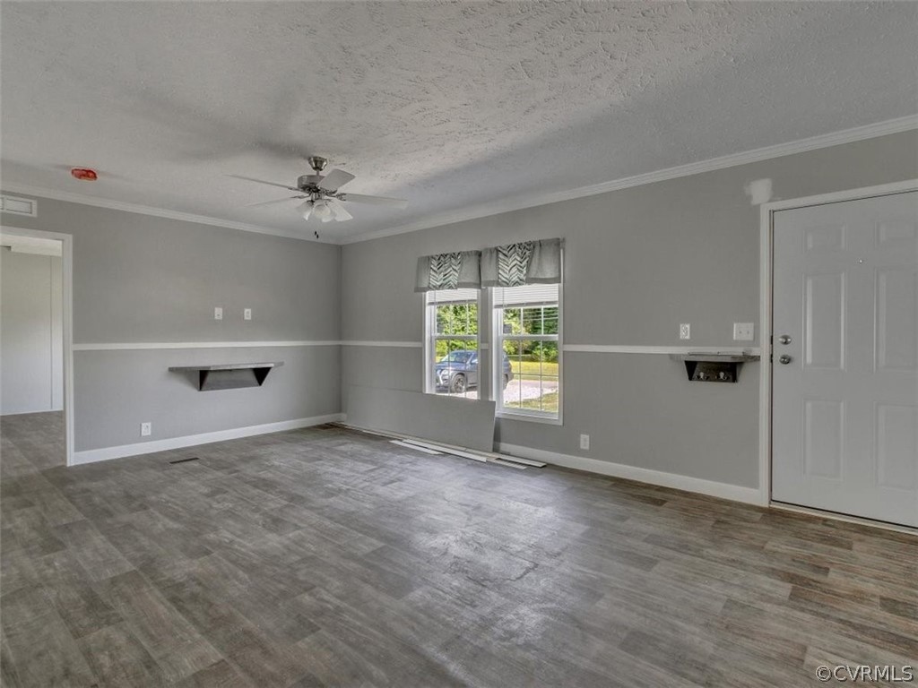 Tbd Railroad Avenue Dendron, VA 23839 - Photo 5 of 22 an empty room with windows and closet