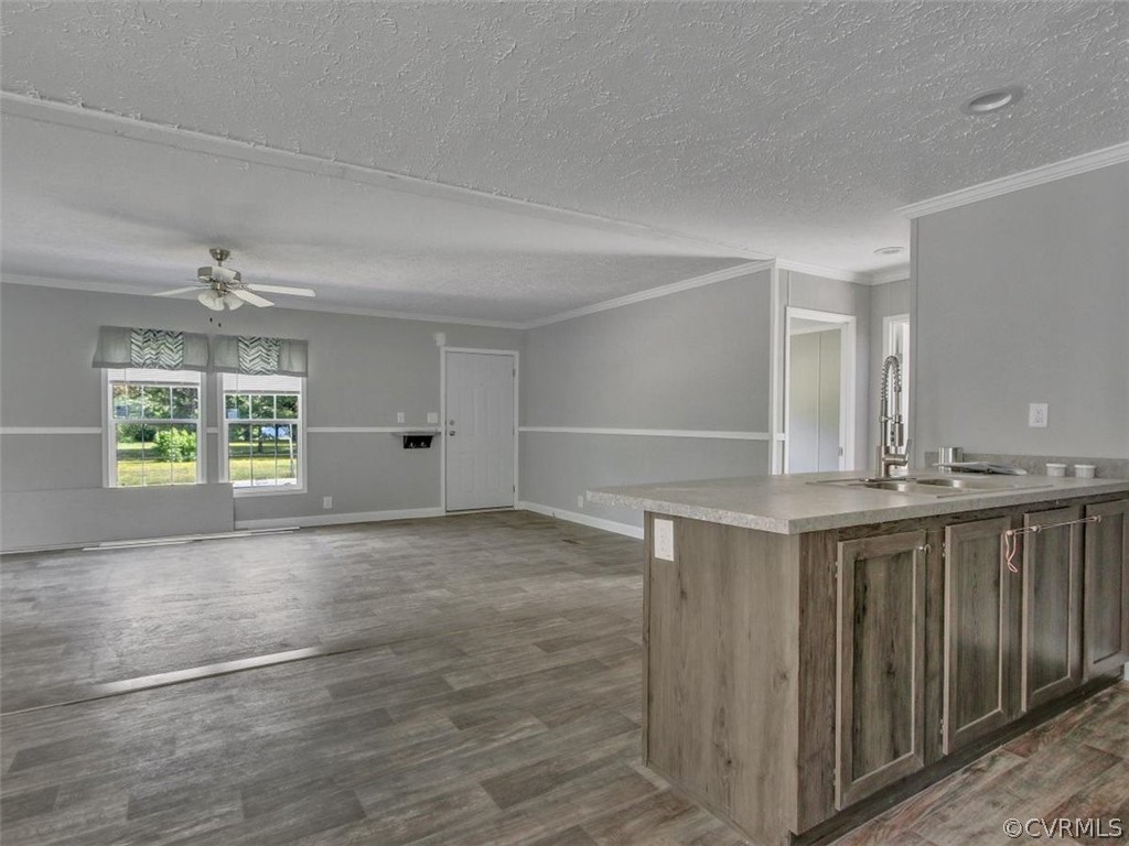 Tbd Railroad Avenue Dendron, VA 23839 - Photo 10 of 22 a view of kitchen with wooden floor and window