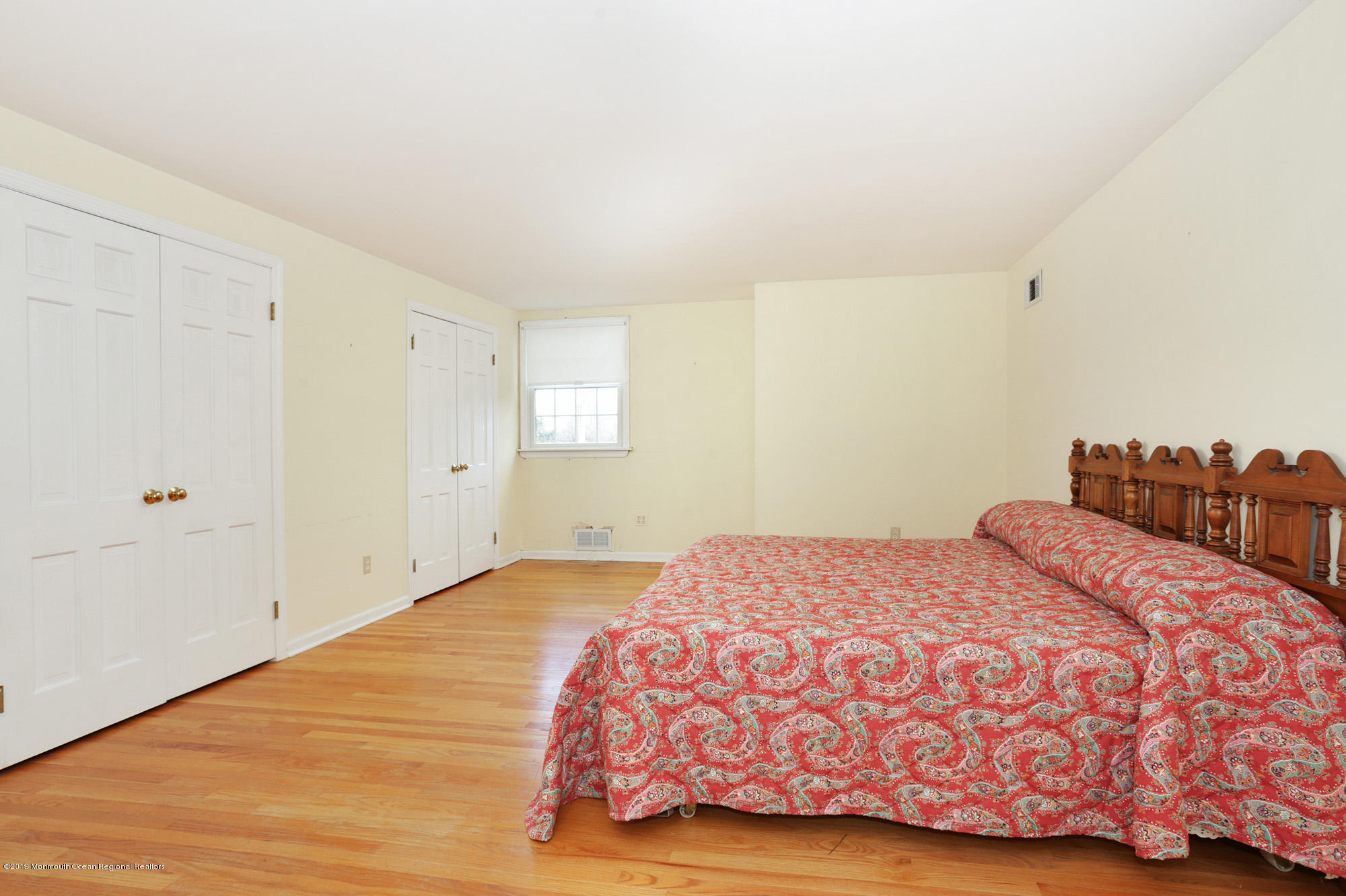 250 Newman Springs Road Colts Neck, NJ 07722 - Photo 17 of 43 a bedroom with a bed and a window