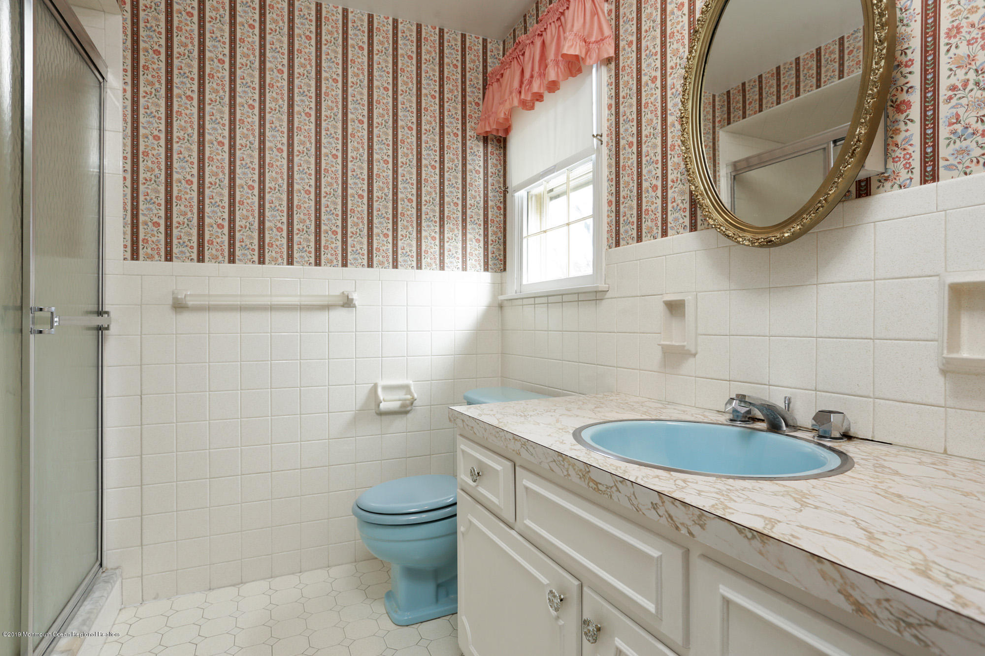 250 Newman Springs Road Colts Neck, NJ 07722 - Photo 21 of 43 a bathroom with a sink a toilet and a mirror
