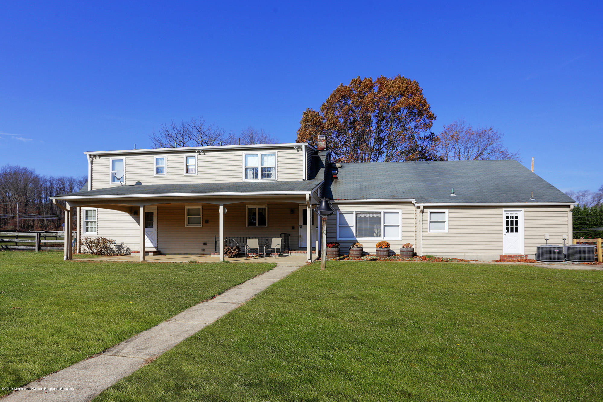 250 Newman Springs Road Colts Neck, NJ 07722 - Photo 24 of 43 a view of a house with a yard and sitting area